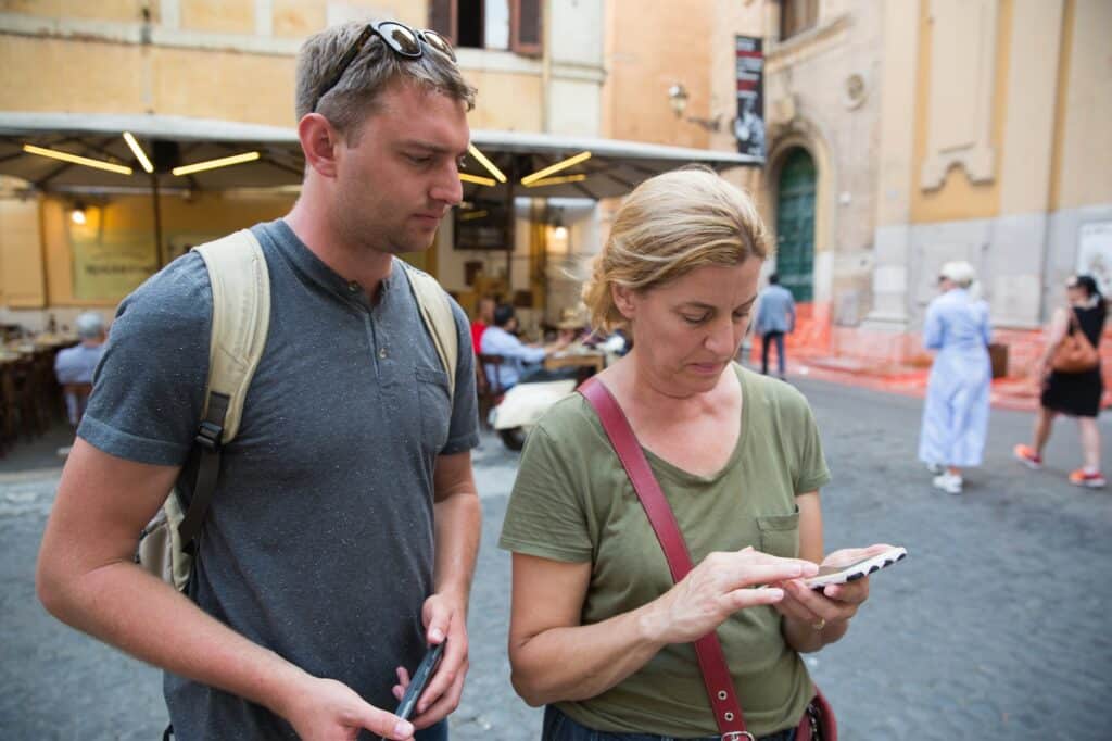 A man and a woman traveling in Italy