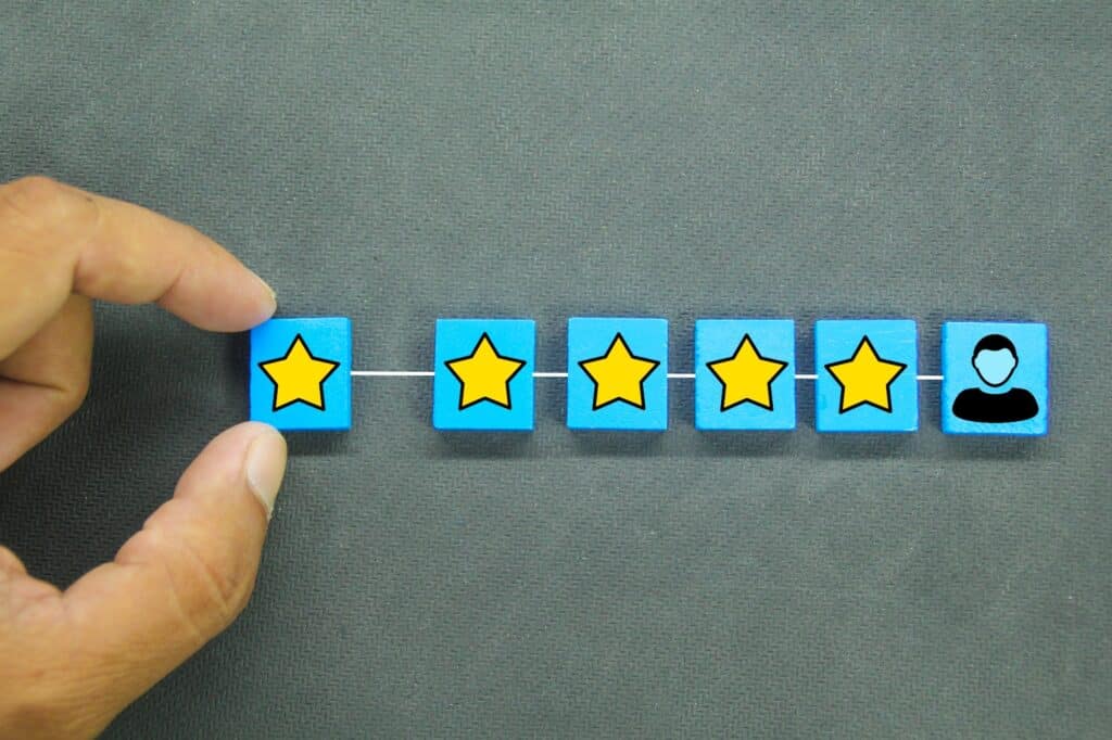 blue squares and comment stars. customer review concept