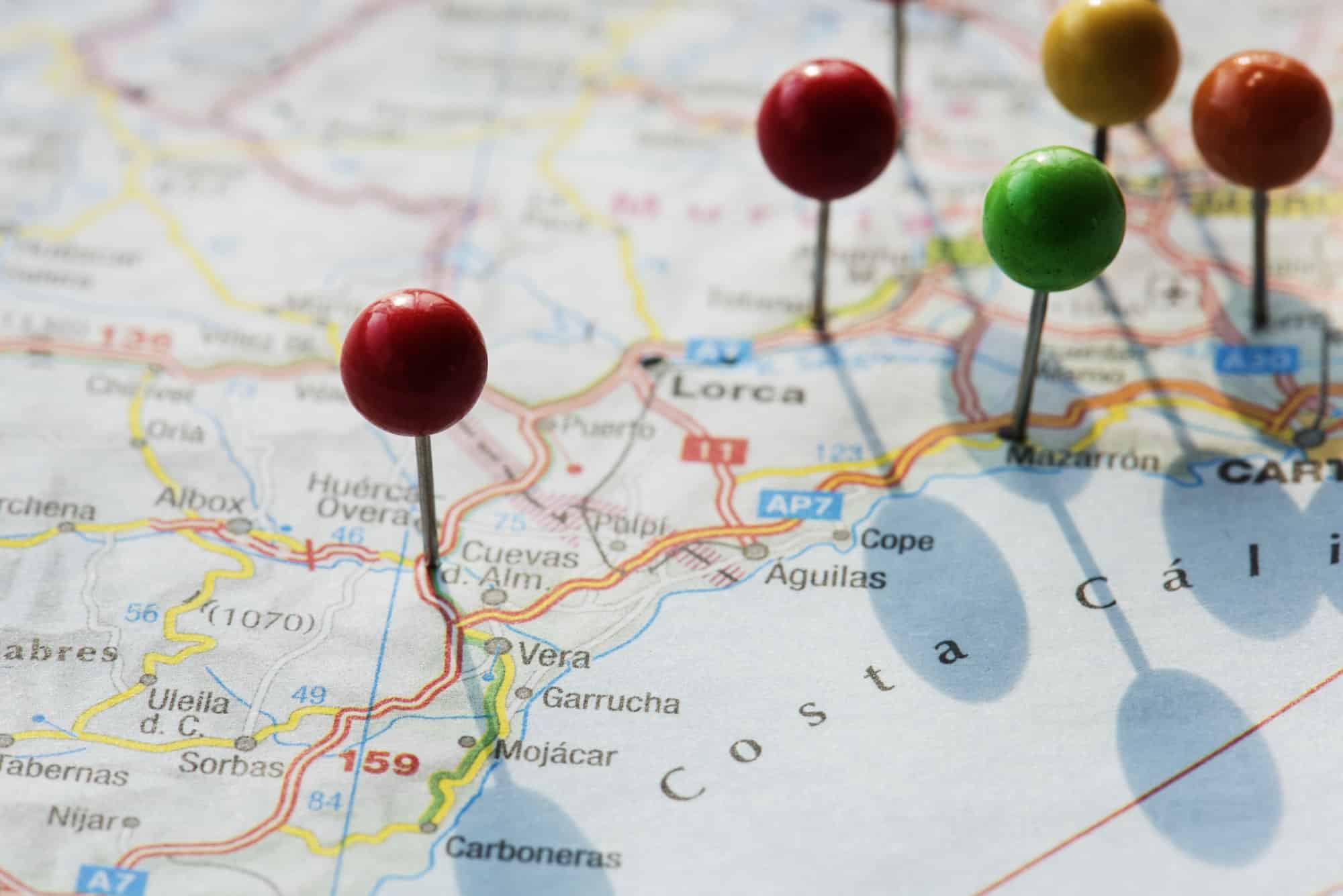 Closeup of pins on the map planning travel journey