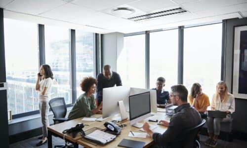 Creative business team working together in a busy casual office