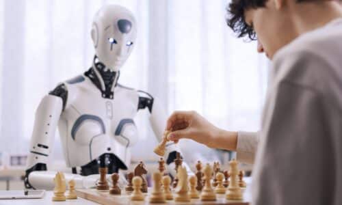 Intense competition: boy vs. robot chess match
